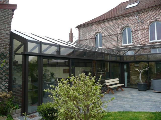 Agrandissement de maison totalement sur mesure en aluminium avec baies coulissantes de bonne qualité gamme Reynaers